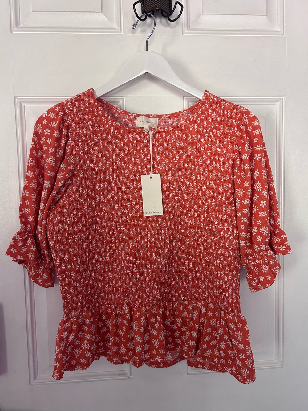 MELLODAY Coral Floral Smocked Peplum Top